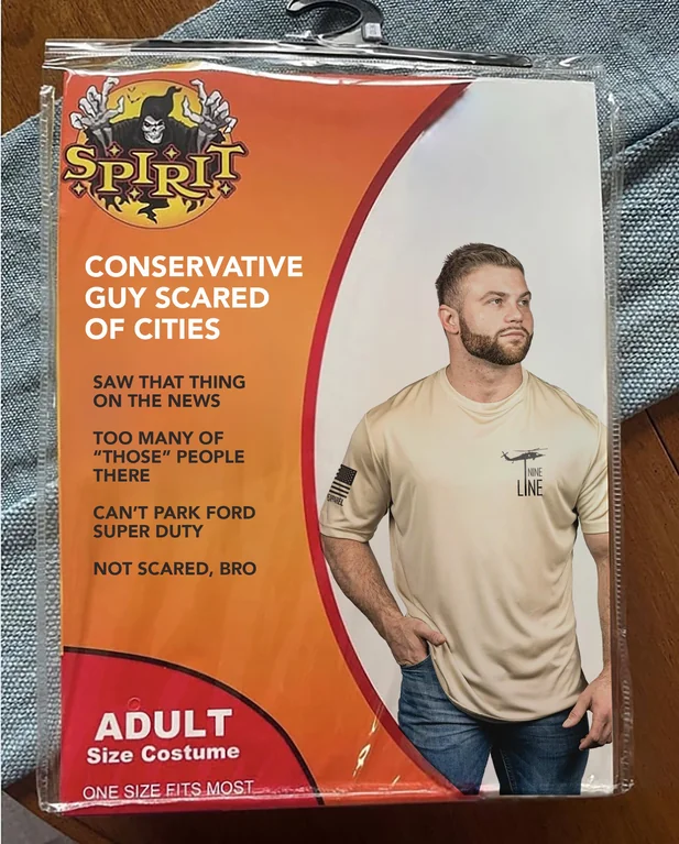 A parody Halloween costume package from "Spirit" features the title "Conservative Guy Scared of Cities." The image shows a bearded man in a tactical-style "Nine Line" shirt posing confidently. Text on the package humorously lists features of the costume: "Saw that thing on the news," "Too many of 'those' people there," "Can’t park Ford Super Duty," and "Not scared, bro." The costume is labeled as "Adult Size Costume – One Size Fits Most."
