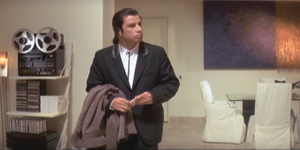 GIF of confused Travolta looking around, from Pulp Fiction.